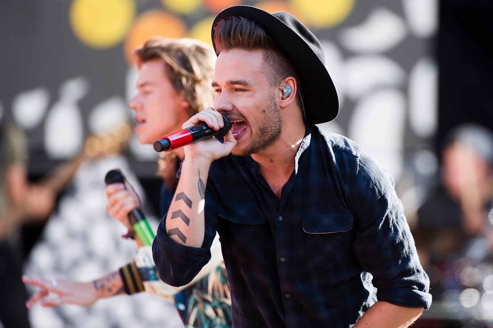 FILE - One Direction members, from right, Liam Payne and Harry Styles perform on ABC's "Good Morning America" at Rumsey Playfield/SummerStage on Tuesday, Aug. 4, 2015, in New York. (Photo by Charles Sykes/Invision/AP, File)