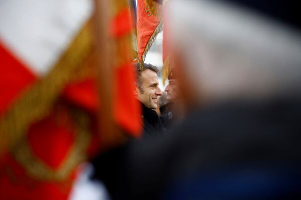 French President Emmanuel Macron attends a military ceremony during a visit at the Digital Support and Cyber Command (CATNC) of the French Army as part of his New Year address to the Armed Forces, in Cesson-Sevigne, western France, Monday, Jan. 20, 2025. (Stephane Mahe/Pool via AP)