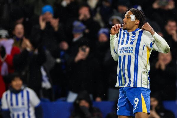 Brighton's Joao Pedro celebrates after scoring a penalty kick during the English Premier League soccer match between Brighton and Hove Albion FC and Arsenal at the Amex stadium in Brighton, Saturday, Jan. 4, 2025. (AP Photo/Ian Walton)