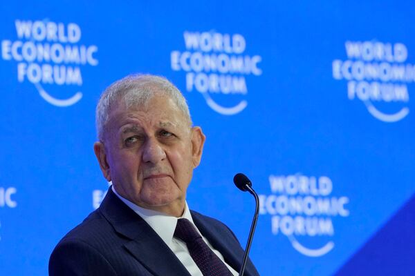 President of Iraq Abdul Latif Rashid attends the Annual Meeting of World Economic Forum in Davos, Switzerland, Thursday, Jan. 23, 2025. (AP Photo/Markus Schreiber)