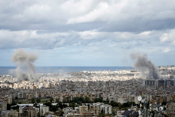 Smoke rises after an Israeli airstrike on Dahiyeh, in the southern suburb of Beirut, Lebanon, Monday, Nov. 25, 2024. (AP Photo/Bilal Hussein)