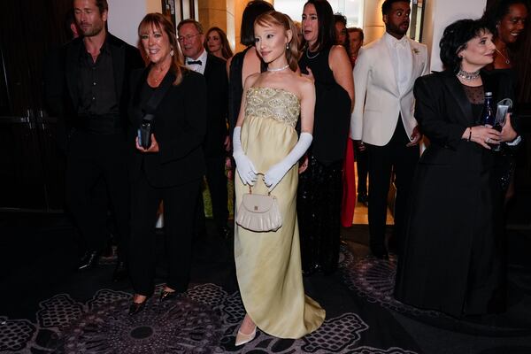 Ariana Grande arrives at the 82nd Golden Globes on Sunday, Jan. 5, 2025, at the Beverly Hilton in Beverly Hills, Calif. (AP Photo/Chris Pizzello)