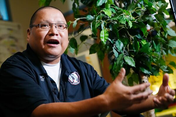 Jason Jones, cultural success coach and care center manager, talks about the care center at San Carlos High School Tuesday, Aug. 27, 2024, in San Carlos, Ariz. (AP Photo/Ross D. Franklin)