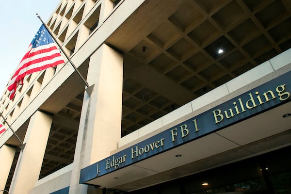 FILE - The FBI's J. Edgar Hoover headquarters building is seen in Washington on Nov. 2, 2016. (AP Photo/Cliff Owen, File)