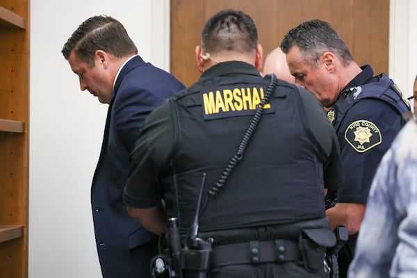 FILE - Auburn Police Officer Jeffrey Nelson is taken into custody after two guilty verdicts, of second-degree murder and first-degree assault for shooting Jesse Sarey twice while trying to arrest him for disorderly conduct, were handed down by the jury at the King County Maleng Regional Justice Center in Kent, Wash., Thursday, June 27, 2024. (Kevin Clark/The Seattle Times via AP, File)