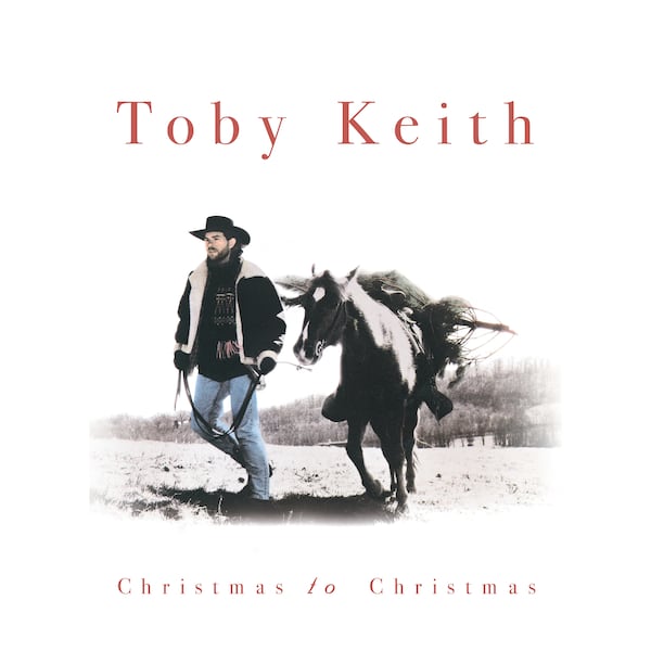 This album cover image released by Mercury Nashville/UMG shows “Christmas to Christmas," a reissue by Toby Keith. (Mercury Nashville/UMG via AP)