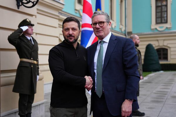 British Prime Minister Keir Starmer, right and Ukrainian President Volodymyr Zelenskyy arrive for their bilateral talks in Kyiv, Ukraine Thursday, Jan. 16, 2025. (Carl Court/Pool Photo via AP)