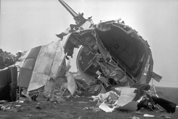 FILE - This Oct. 31, 1960 file photo, shows the broken hull and wreckage of a chartered plane that crashed on Oct. 29, 1960, killing 22 people, including 16 Cal Poly football players, a manager and a booster, is shown in Toledo, Ohio. The team was returning home after playing Bowling Green in a college football game when the plane crashed shortly after take-off. (AP Photo/File)