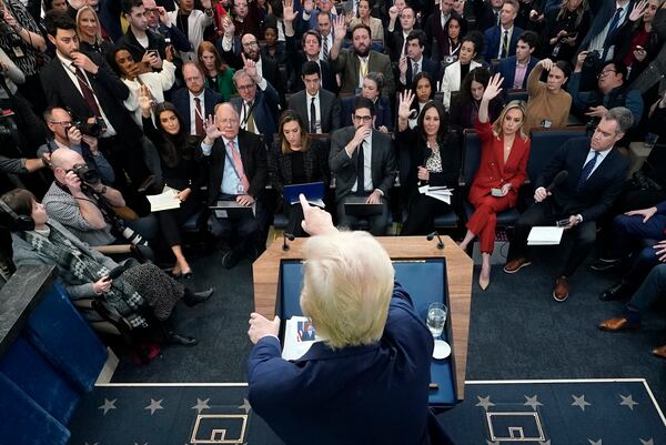 President Donald Trump points to a reporter for a question as he speaks in the James Brady Press Briefing Room at the White House, Thursday, Jan. 30, 2025, in Washington. (AP Photo/Alex Brandon)