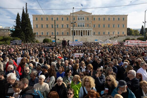 People attend a rally organised by the association of the families of victims of the Tempi train collision, which killed 57 people almost two years ago, at central Syntagma square, in Athens, Greece, Sunday, Jan. 26, 2025. (AP Photo/Yorgos Karahalis)