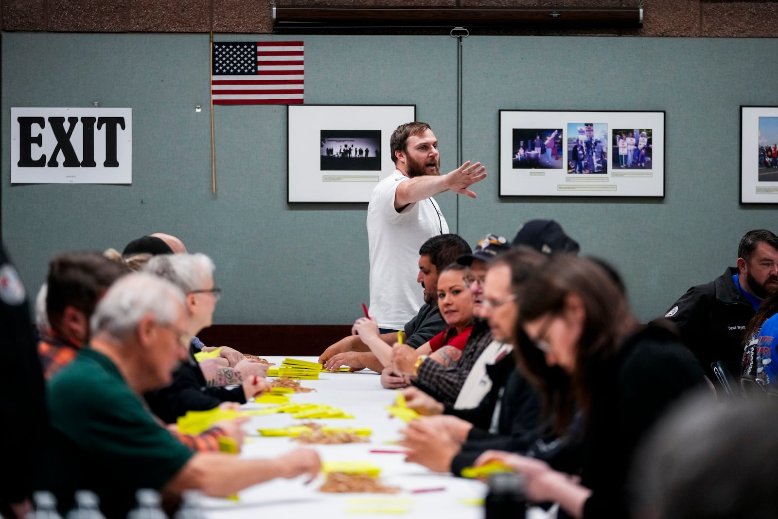 Volunteers tally votes on a new contract offer from Boeing, Wednesday, Oct. 23, 2024, at Seattle Union Hall in Seattle. (AP Photo/Lindsey Wasson)