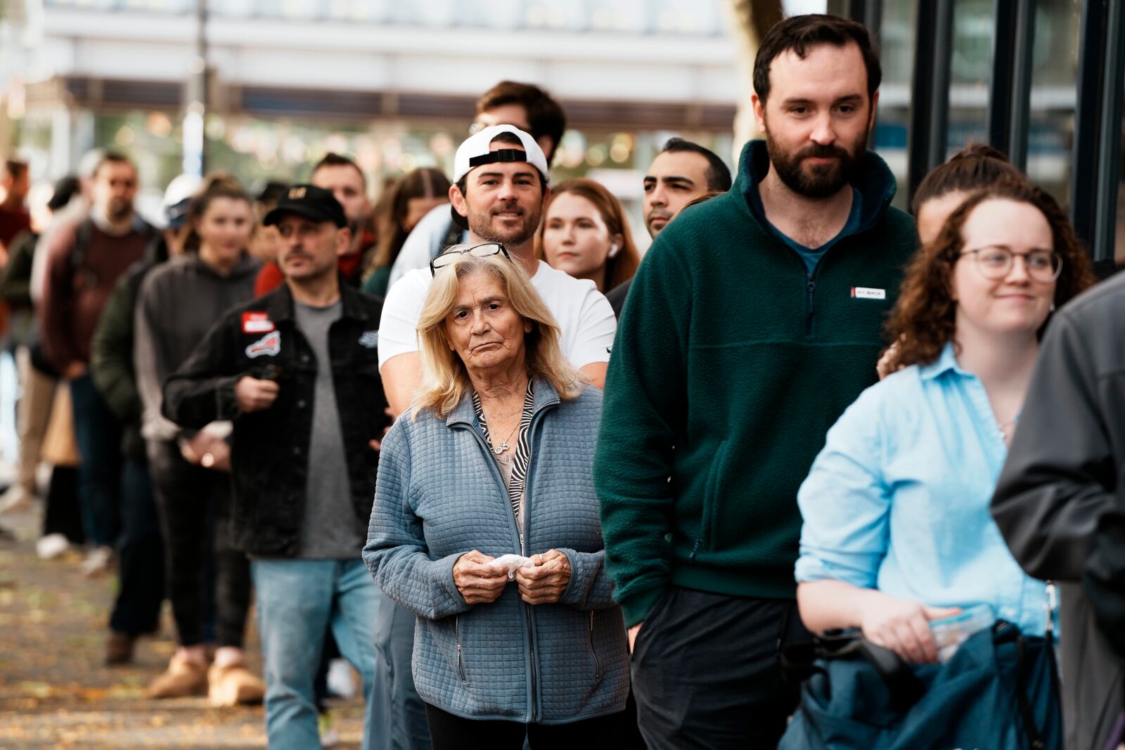 People wait in line to vote on Election Day, Tuesday, Nov. 5, 2024, in the East Boston neighborhood of Boston. (AP Photo/Michael Dwyer)