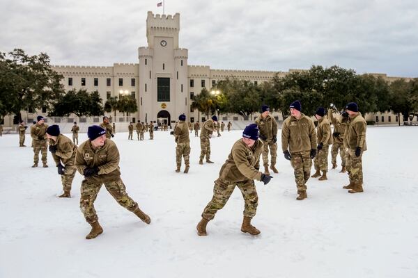 Citadel cadets engage in a snowball fight during a very rare snow day to their campus on Wednesday Jan. 22, 2025 in Charleston, S.C. (Ed Wray/The Citadel via AP)