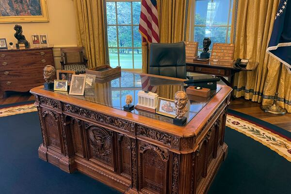 A replica of the Resolute desk sits in a reproduction of the White House Oval Office is displayed at the Clinton Presidential Library and Museum in Little Rock, Ark., Tuesday, Nov. 12, 2024. (AP Photo/Andrew DeMillo)