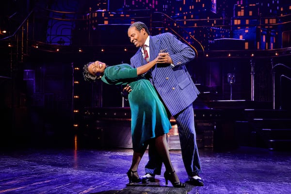 Darlesia Cearcy portrays Lucille Wilson, left, and James Monroe Iglehart portrays Louis Armstrong during a performance in "A Wonderful World: The Louis Armstrong Musical" in New York. (Jeremy Daniel via AP)