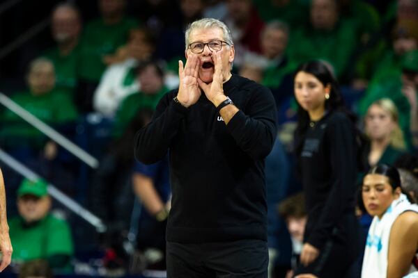 UConn head coach Geno Auriemma shouts towards the court during the first half of an NCAA college basketball game Thursday, Dec. 12, 2024, in South Bend, Ind. (AP Photo/Michael Caterina)