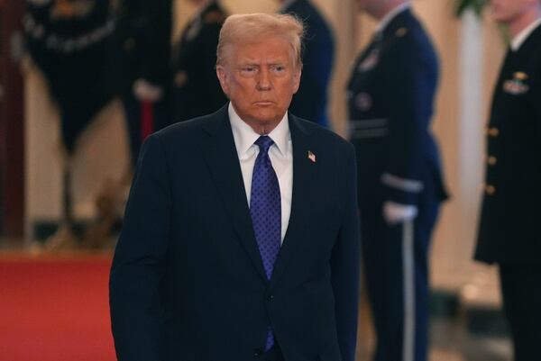 President Donald Trump arrives to sign the Laken Riley Act in the East Room of the White House, Wednesday, Jan. 29, 2025, in Washington. (AP Photo/Evan Vucc)