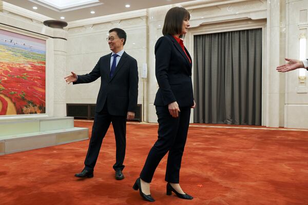 Britain's Chancellor of the Exchequer Rachel Reeves, right, meets Chinese Vice President Han Zheng at the Great Hall of the People in Beijing, Saturday, Jan. 11, 2025. (Florence Lo/Pool Photo via AP)