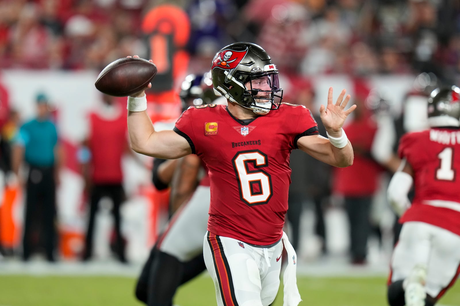 Tampa Bay Buccaneers quarterback Baker Mayfield (6) looks to throw during the second half of an NFL football game against the Baltimore Ravens, Monday, Oct. 21, 2024, in Tampa, Fla. (AP Photo/Chris O'Meara)