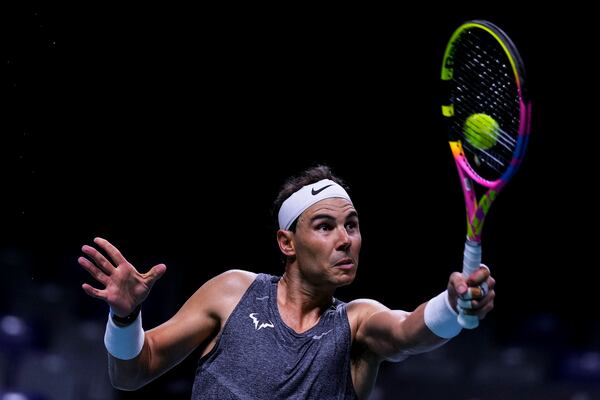 Spain's tennis player Rafael Nadal returns the ball during a training session at the Martin Carpena Sports Hall, in Malaga, southern Spain, on Saturday, Nov. 16, 2024. (AP Photo/Manu Fernandez)