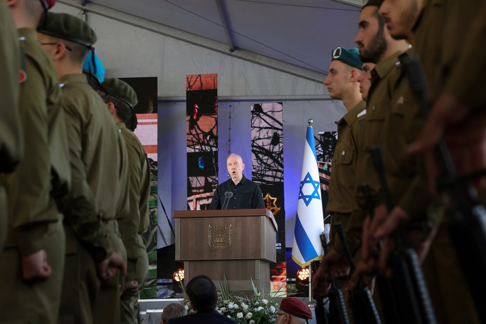 Israel's Defense Minister Yoav Gallant speaks during a ceremony marking the Hebrew calendar anniversary of the Hamas attack on October 7 last year that sparked the ongoing war in Gaza, at the Mount Herzl military cemetery in Jerusalem, Israel Sunday Oct. 27, 2024. (Gil Cohen-Magen/Pool Photo via AP)