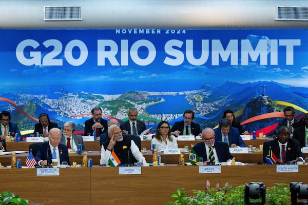 President Joe Biden, from front left, Indian's Prime Minister Narendra Modi, Brazil's President Luis Inacio Lula da Silva, South Africa's President Cyril Ramaphosa and other G20 leaders listen during the G20 Summit at the Museum of Modern Art in Rio de Janeiro, Monday, Nov. 18, 2024. (Eric Lee/The New York Times via AP, Pool)