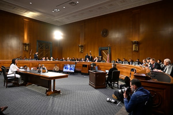 Former Rep. Tulsi Gabbard, President Donald Trump's choice to be the Director of National Intelligence, appears before the Senate Intelligence Committee for her confirmation hearing at the U.S. Capitol, Thursday, Jan. 30, 2025, in Washington. (AP Photo/John McDonnell)