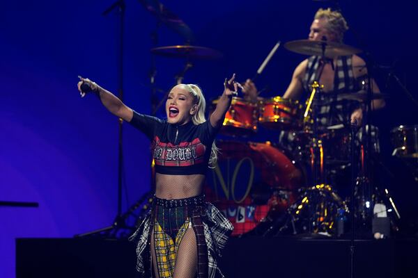 Gwen Stefani, left, and Adrian Young of No Doubt perform during the FireAid benefit concert on Thursday, Jan. 30, 2025, at The Forum in Inglewood, Calif. (AP Photo/Chris Pizzello)