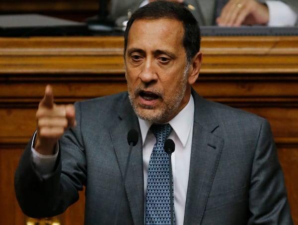 FILE - Opposition lawmaker and economist Jose Guerra speaks during a congressional session in Caracas, Venezuela, Jan. 22, 2016. (AP Photo/Ariana Cubillos, File)