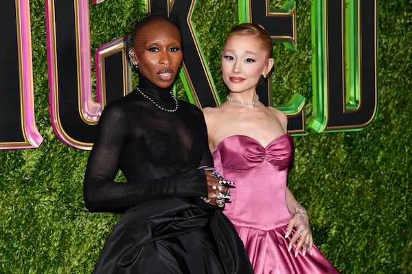 FILE - Cynthia Erivo, left, and Ariana Grande attend the premiere of "Wicked" at the Museum of Modern Art, Nov. 14, 2024, in New York. (Photo by Evan Agostini/Invision/AP, File)