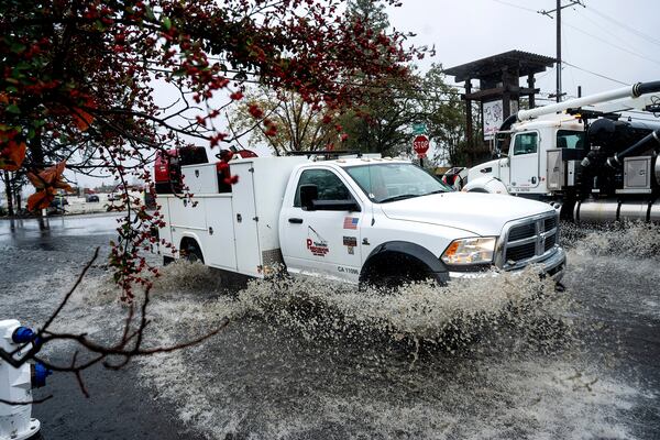 A truck crosses a flooded road Wednesday, Nov. 20, 2024, in Santa Rosa, Calif. (AP Photo/Noah Berger)