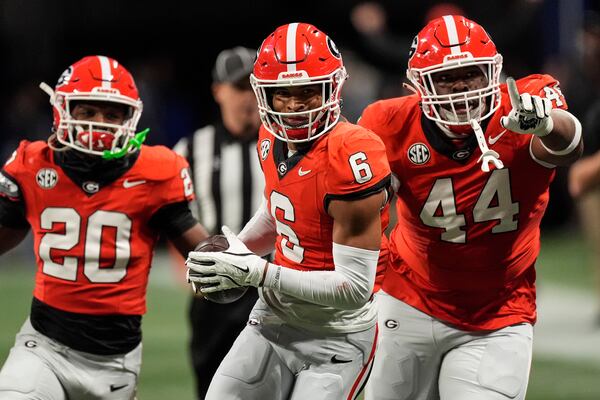 Georgia defensive back Daylen Everette (6) celebrates his interception Texas during the second half of the Southeastern Conference championship NCAA college football game, Saturday, Dec. 7, 2024, in Atlanta. (AP Photo/John Bazemore)