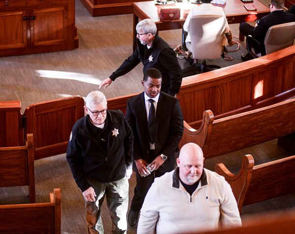 Sheldon "Timothy" Herrington Jr., who is on trial for the murder of University of Mississippi student Jimmie "Jay" Lee, leaves the courtroom as the jury is sent back for further deliberations, at the Lafayette County Courthouse in Oxford, Miss. on Wednesday, Dec. 11, 2024. (Bruce Newman/The Northeast Mississippi Daily Journal, via AP, Pool)