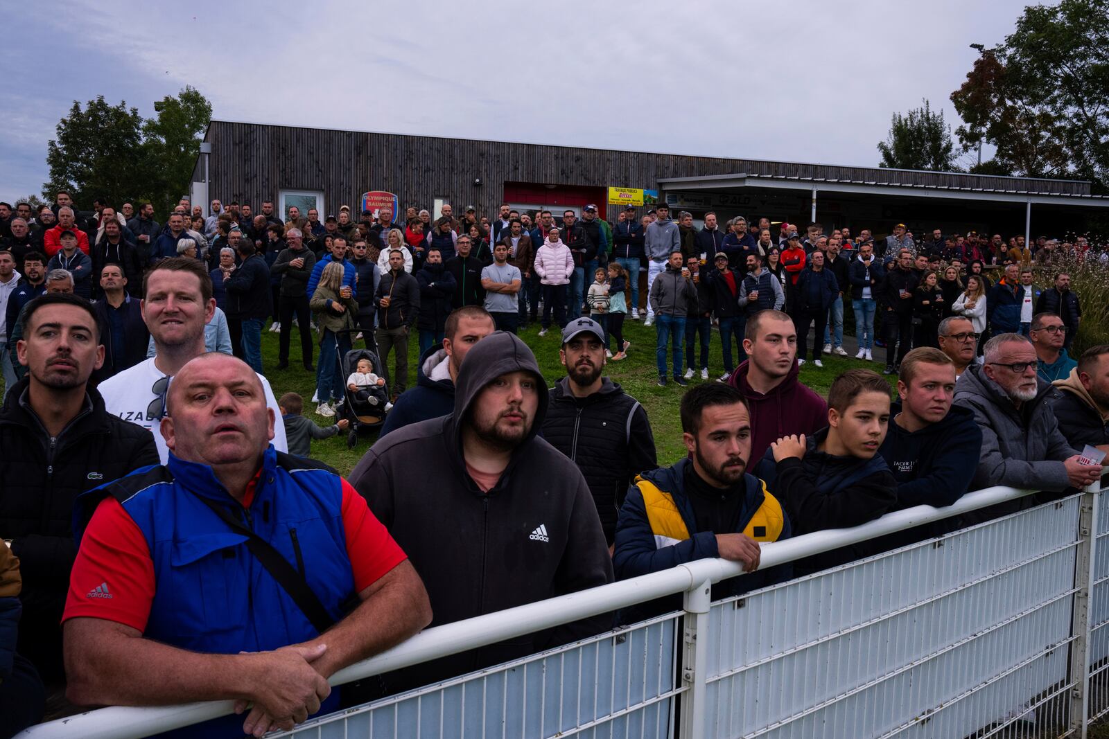 Spectators watch the Championnat National 2 soccer match between Saumur and Bordeaux, in Saumur, France, Saturday, Oct. 5, 2024.(AP Photo/Louise Delmotte)