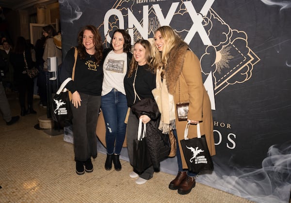 Audience members attend author Rebecca Yarros in conversation of her new book "Onyx Storm" at The Town Hall on Friday, Jan. 24, 2025, in New York. (Photo by CJ Rivera/Invision/AP)