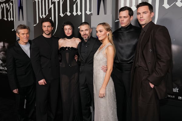 Willem Dafoe, from left, Aaron Taylor-Johnson, Emma Corrin, Robert Eggers, Lily-Rose Depp, Bill Scarsgard, and Nicholas Hoult arrive at the premiere of "Nosferatu" on Thursday, Dec. 12, 2024, at TCL Chinese Theatre in Los Angeles. (Photo by Jordan Strauss/Invision/AP)