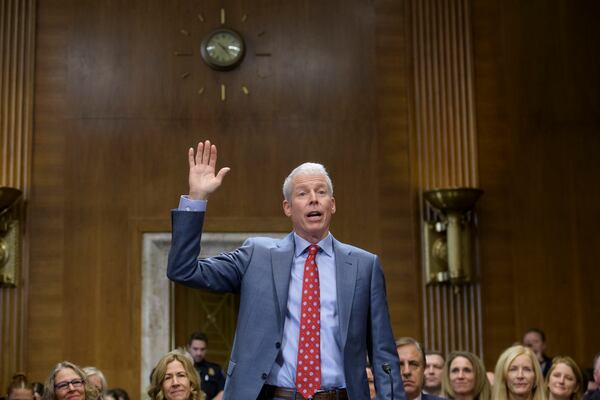 Chris Wright, President-elect Donald Trump's nominee to be Secretary of Energy, is sworn-in during a Senate Committee on Energy and Natural Resources hearing for his pending confirmation, on Capitol Hill, Wednesday, Jan. 15, 2025, in Washington. (AP Photo/Rod Lamkey, Jr.)