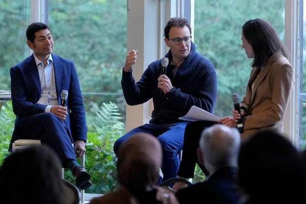 Dario Amodei, CEO & Co-Founder of Anthropic, middle, speaks on a panel between Tino Cuéllar, President of the Carnegie Endowment for International Peace, left, and Elizabeth Kelly, Director of the U.S. AI Safety Institute, at the convening of the International Network of AI Safety Institutes at the Golden Gate Club at the Presidio in San Francisco, Wednesday, Nov. 20, 2024. (AP Photo/Jeff Chiu)