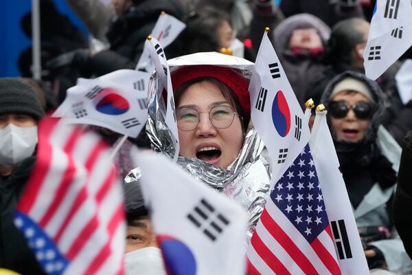 A supporter of impeached South Korean President Yoon Suk Yeol shouts slogans during a rally to oppose his impeachment near the presidential residence in Seoul, South Korea, Monday, Jan. 6, 2025. (AP Photo/Ahn Young-joon)