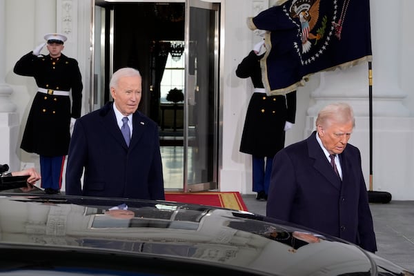 President Joe Biden and President-elect Donald Trump walk out to the presidential limousine, as they depart the White House, Monday, Jan. 20, 2025, in Washington, enroute to the Capitol. (AP Photo/Alex Brandon)