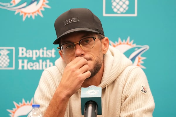 Miami Dolphins head coach Mike McDaniel gestures during a post season news conference, Tuesday, Jan. 7, 2025, in Miami Gardens, Fla. (AP Photo/Marta Lavandier)