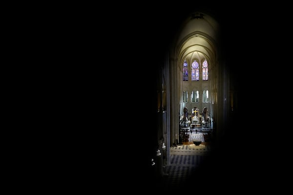 A view of the Notre-Dame cathedral while French President Emmanuel Macron visits the restored interiors monument, Friday, Nov. 29, 2024 in Paris. (Sarah Meyssonnier/Pool via AP)