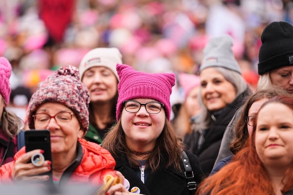 A group gathers at Franklin Park before the People's March, Saturday, Jan. 18, 2025, in Washington. (AP Photo/Julio Cortez)