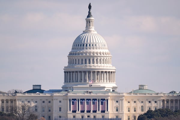 The U.S. flag at the U.S. Capitol is at full height on the day of the 60th Presidential Inauguration, Monday, Jan. 20, 2025, in Washington. Flags are supposed to fly at half-staff through the end of January out of respect for former President Jimmy Carter, who died Dec. 29, 2024. (AP Photo/Mike Stewart)