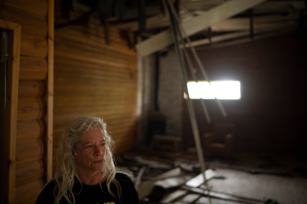 CORRECTS SURNAME.- Orna Weinberg stands at the damaged dining hall, that was hit by a rocket fired from Lebanon, in the Kibbutz Manara, northern Israel, Thursday, Nov. 28, 2024. (AP Photo/Leo Correa)