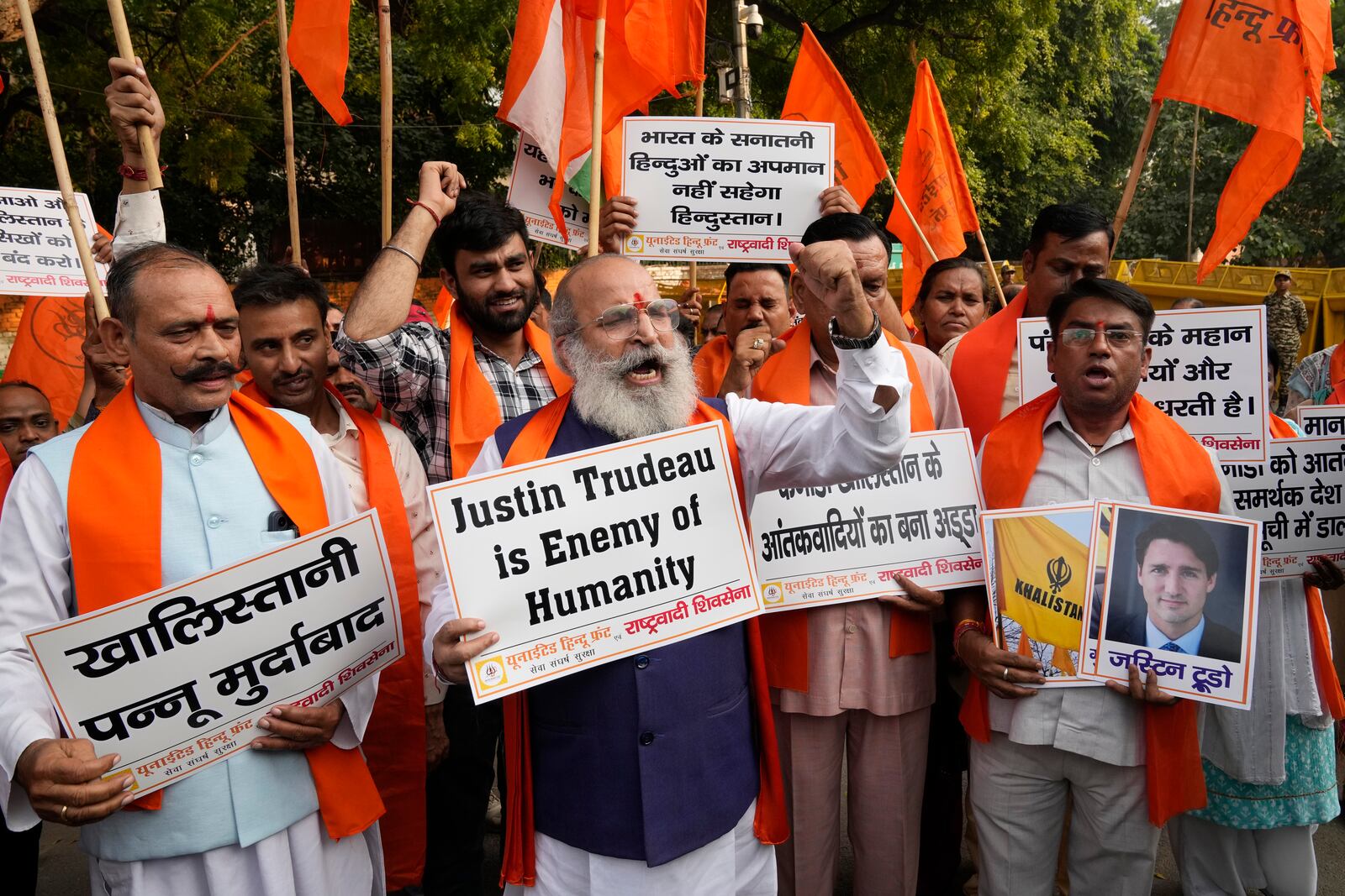 Activists of United Hindu Front, a right wing group reacting to Canada’s allegation that Indian Home Minister Amit Shah ordered the targeting of Sikh activists inside Canada, hold placards during a protest in New Delhi, India, Tuesday, Nov. 5, 2024. (AP Photo/Manish Swarup)