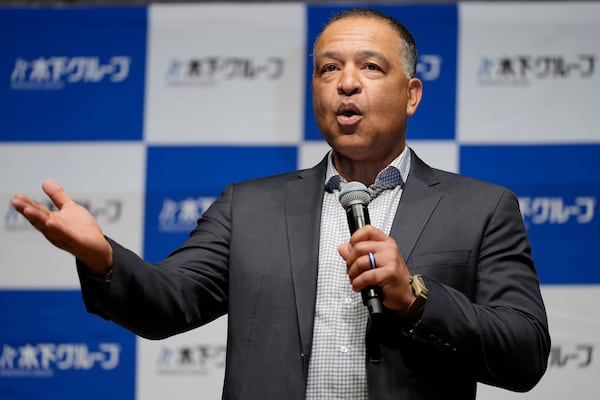 Los Angeles Dodgers manager Dave Roberts attends a press conference on the commercials he appears in Wednesday, Dec. 4, 2024, in Tokyo. (AP Photo/Eugene Hoshiko)