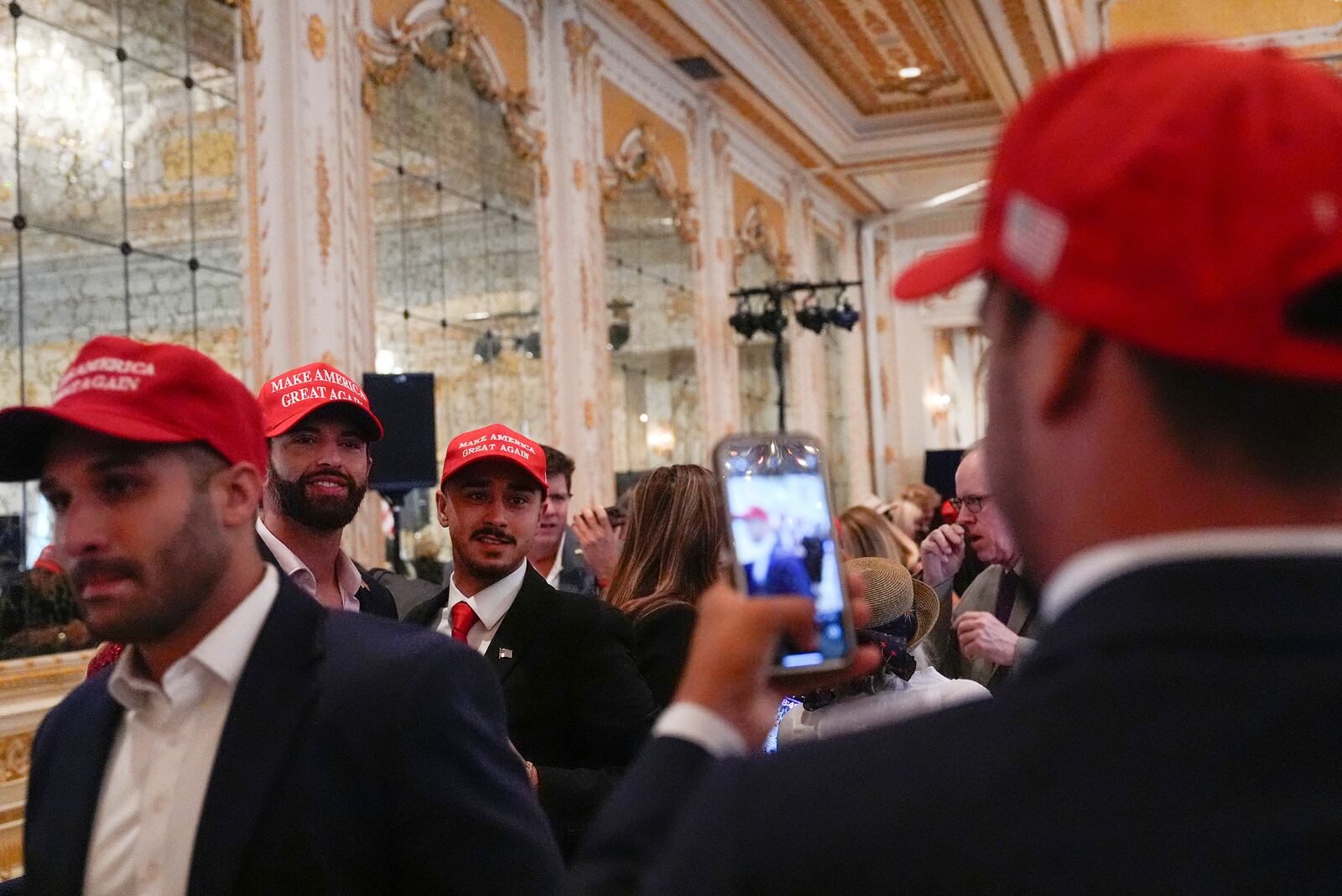 Supporters arrive before Republican presidential nominee former President Donald Trump speaks during a news conference at his Mar-a-Lago estate, Tuesday, Oct. 29, 2024, in Palm Beach, Fla. (AP Photo/Julia Demaree Nikhinson)