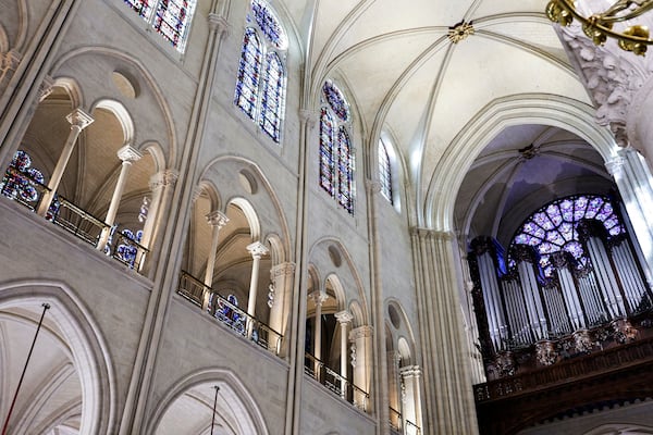 Part of the nave and the organ of Notre-Dame de Paris cathedral are seen while French President Emmanuel Macron visits the restored interiors of the cathedral, Friday Nov. 29, 2024, in Paris. (Stephane de Sakutin, Pool via AP)