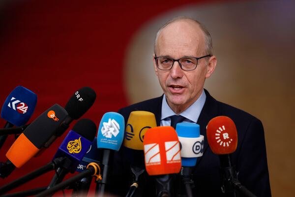 Luxembourg's Prime Minister Luc Frieden speaks with the media as he arrives for an EU summit at the European Council building in Brussels, Thursday, Dec. 19, 2024. (AP Photo/Geert Vanden Wijngaert)